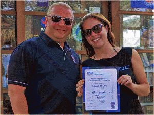 Becky being awarded on the PADI I.E
