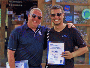 Marco presented with his PADI OWSI