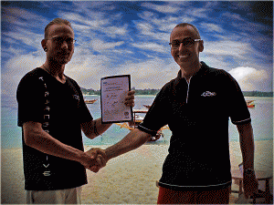 Tim being awarded his Instructor certificate